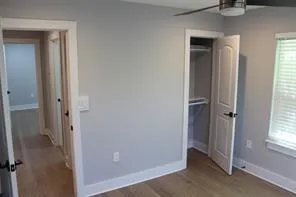 a bathroom with a sink a vanity and a window