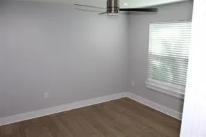 an empty room with mirror