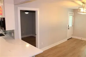 a view of a kitchen cabinets and a sink