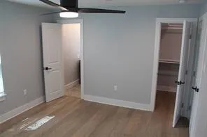 a bathroom with a sink vanity and mirror