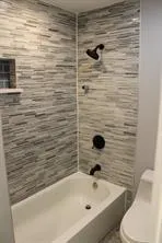 a bathroom with a bathtub