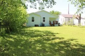 a view of a yard with a trees
