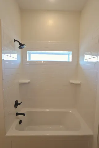 a bathroom with a bathtub
