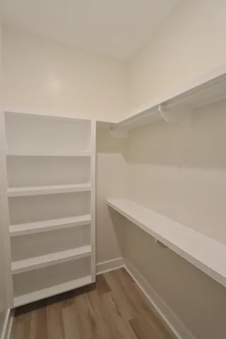 a view of an empty walk in closet