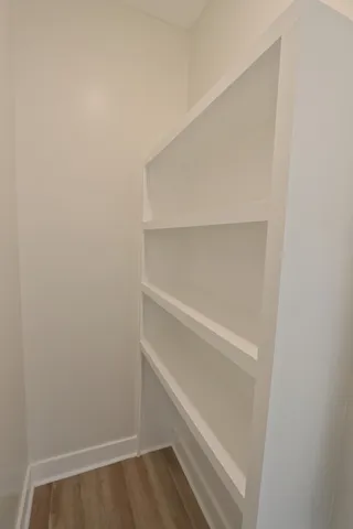 a view of an empty walk in closet