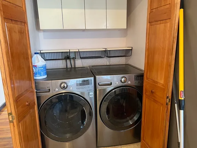 a utility room with dryer and washer