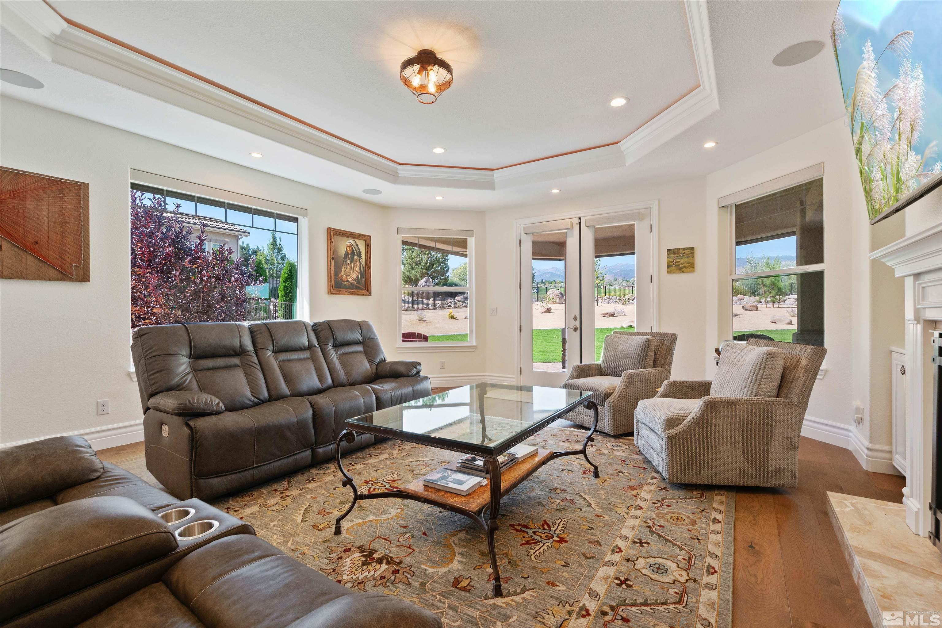 12825 Silver Wolf Road Reno, NV 89511 - Photo 19 of 34 a living room with furniture and a large window