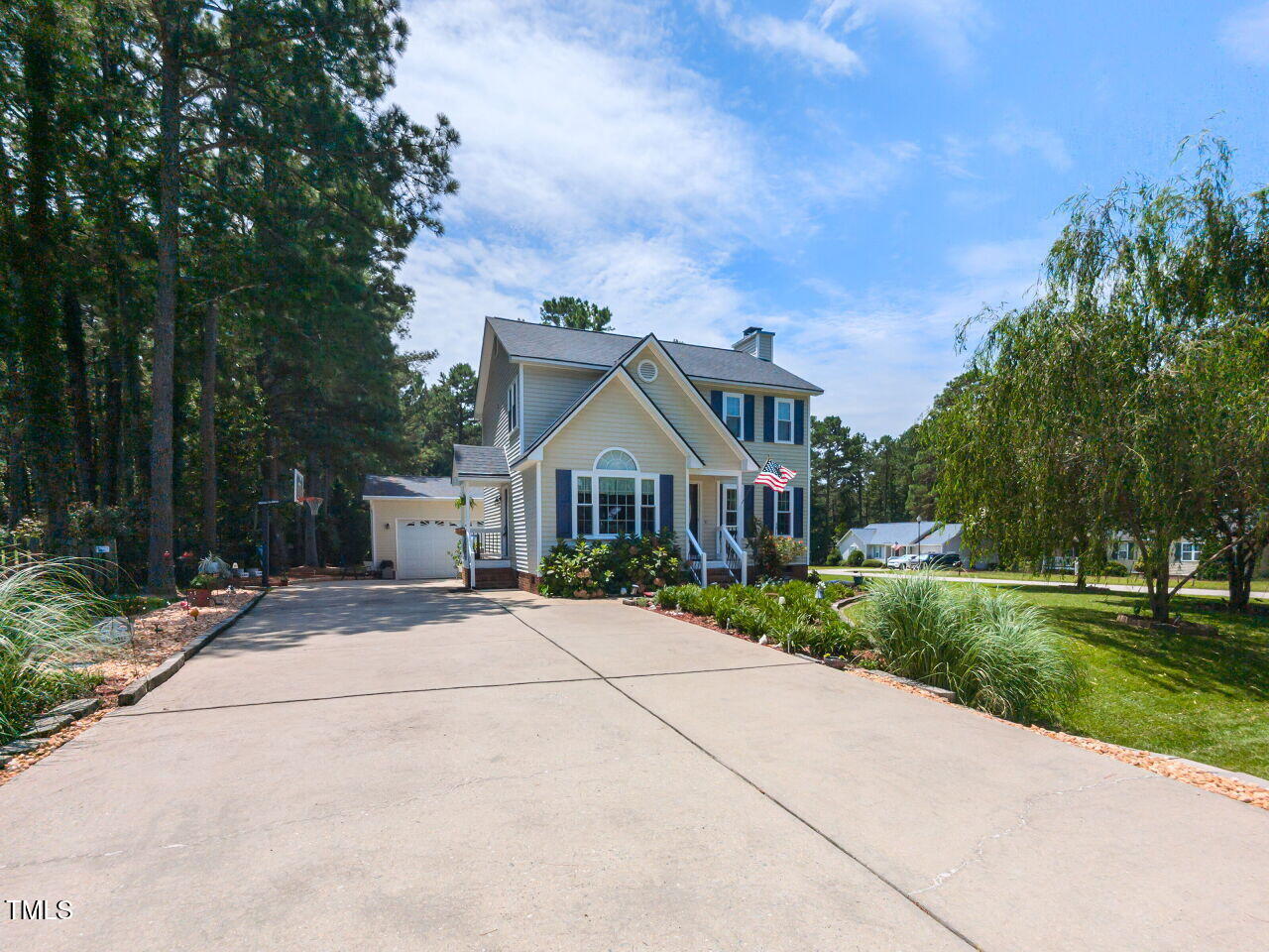 1813 Middle Ridge Drive Willow Spring, NC 27592 - Photo 2 of 31 002-1280x960-driveway