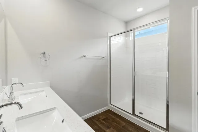 a bathroom with a bathtub and a sink