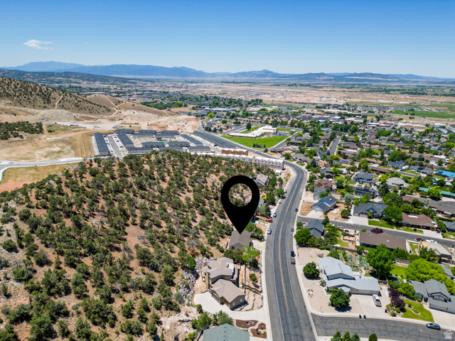 790 East Fiddlers Canyon Road Cedar City, UT 84721 - Photo 33 of 35 Elevated property featuring a natural, treed hillside setting, overlooking a developed residential area