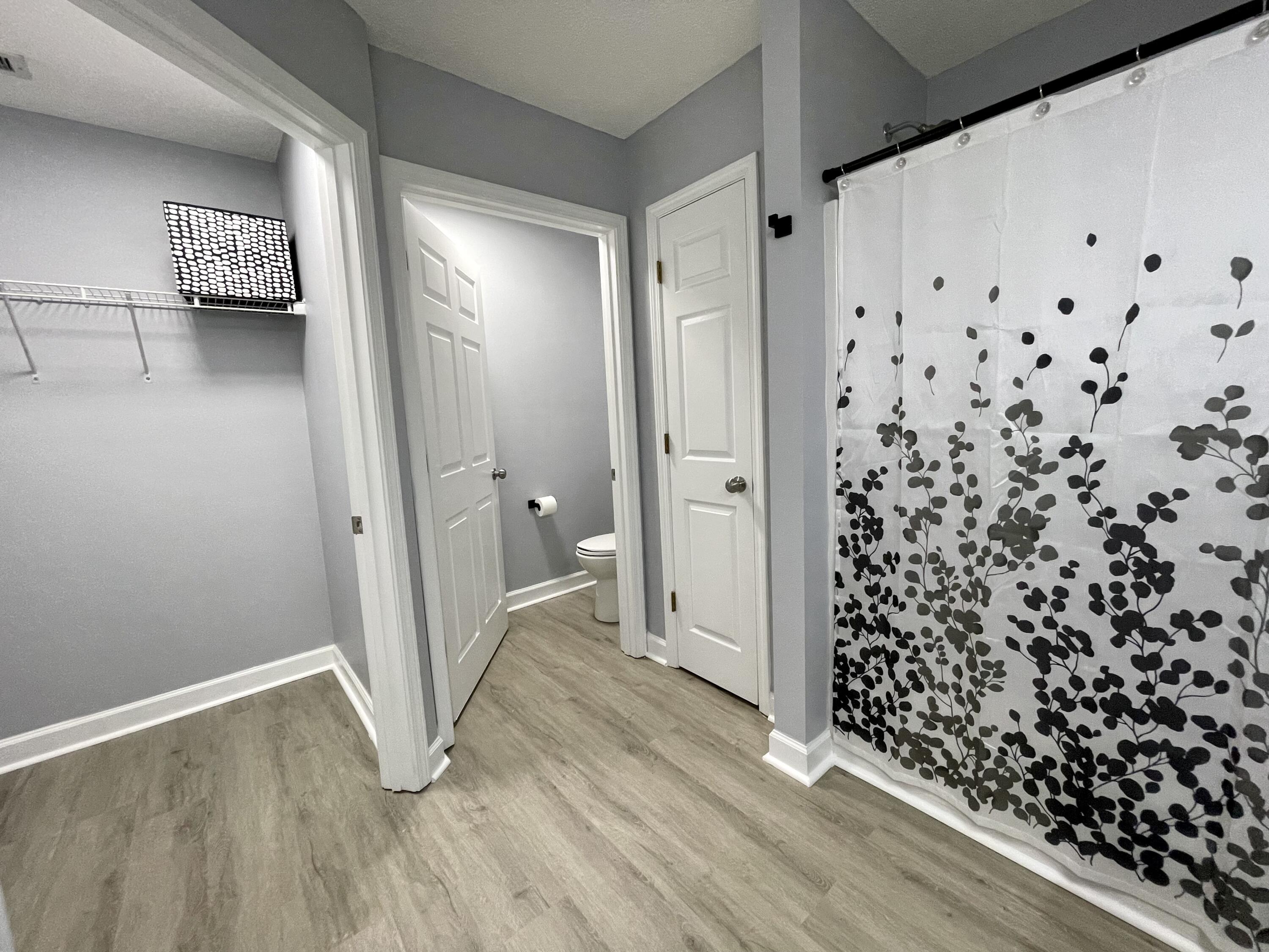 4694 Bobolink Way Crestview, FL 32539 - Photo 24 of 28 a view of hallway with wooden floor