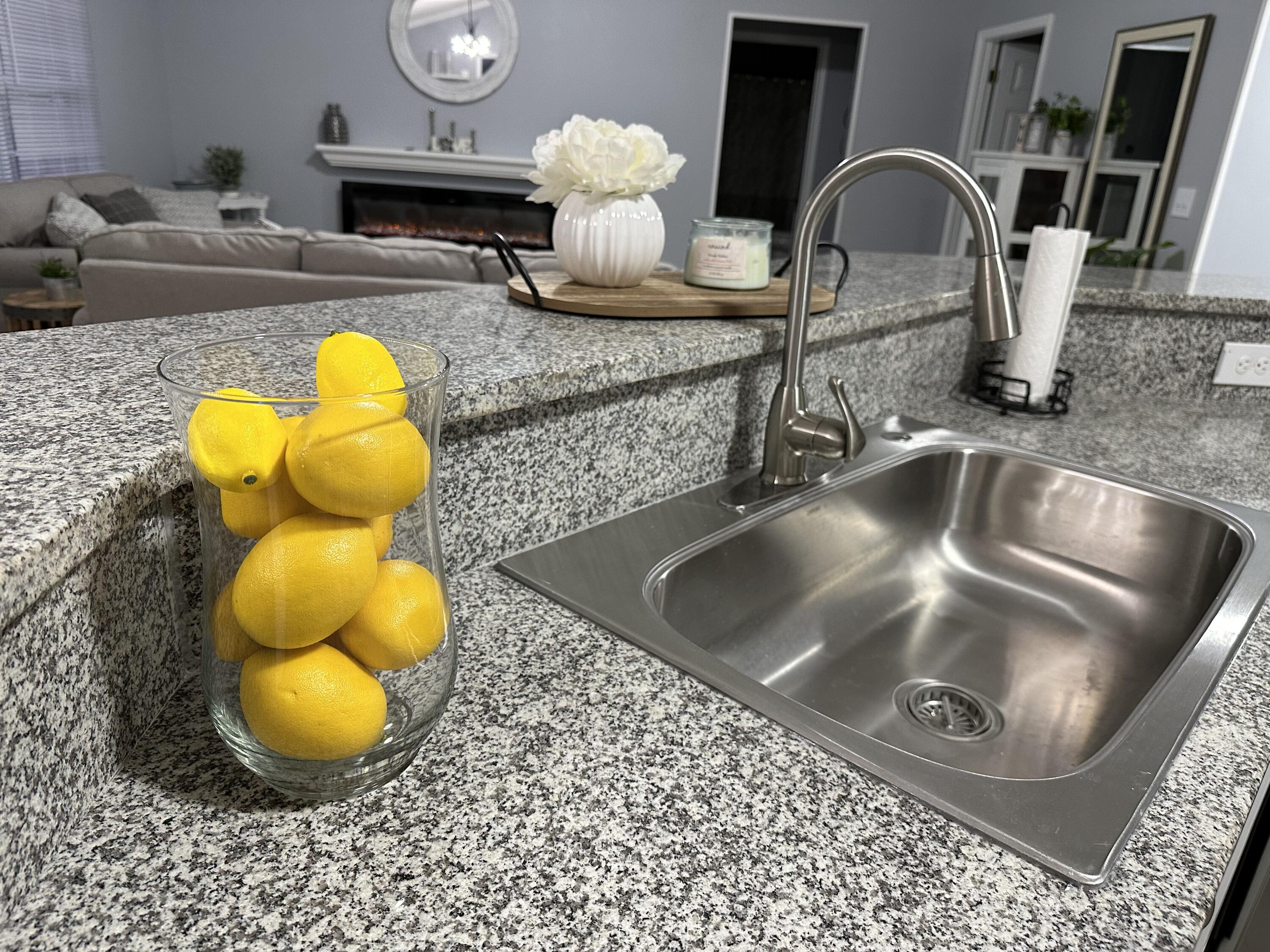 4694 Bobolink Way Crestview, FL 32539 - Photo 28 of 28 a bathroom with a sink mirror and vanity