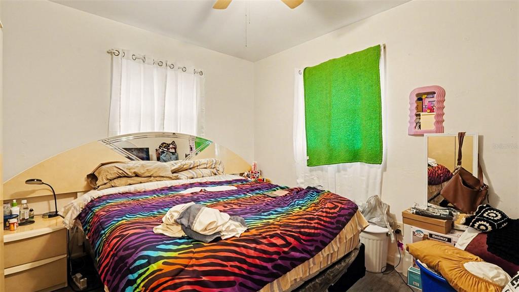 2305 Northeast 35th Street Ocala, FL 34479 - Photo 15 of 26 a bedroom with a bed and a window