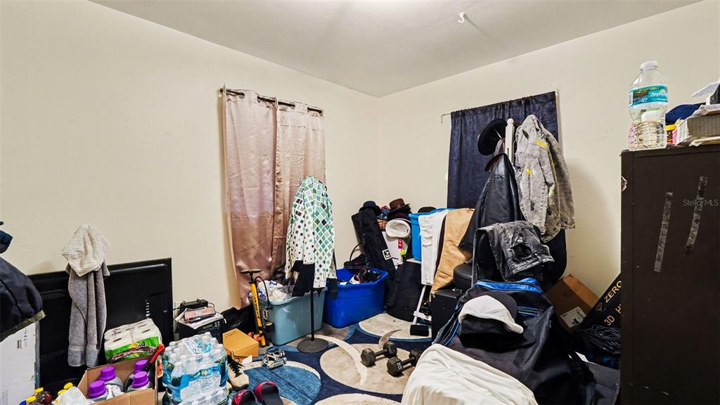 2305 Northeast 35th Street Ocala, FL 34479 - Photo 22 of 26 a view of a room with gym equipment