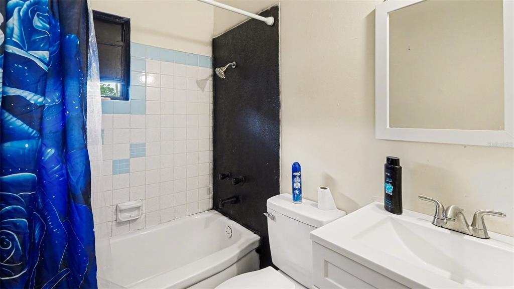 2305 Northeast 35th Street Ocala, FL 34479 - Photo 23 of 26 a bathroom with a sink and toilet