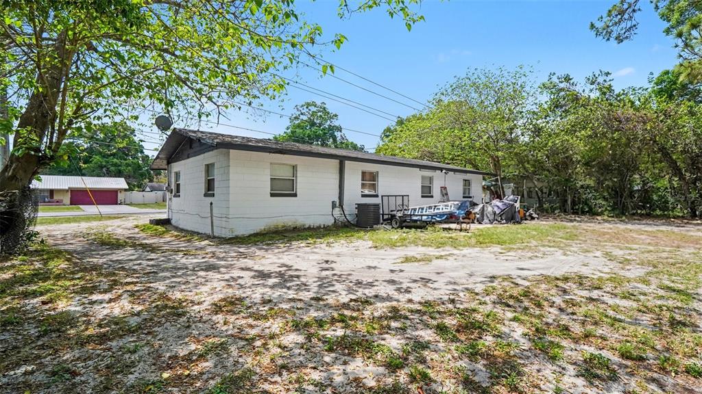 2305 Northeast 35th Street Ocala, FL 34479 - Photo 25 of 26 a view of a house with a yard