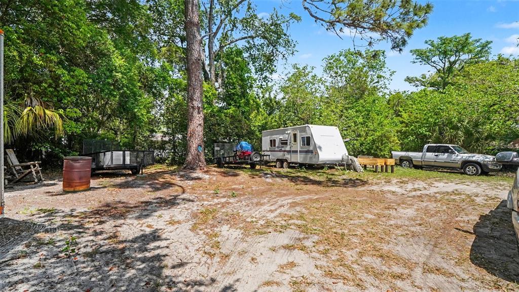 2305 Northeast 35th Street Ocala, FL 34479 - Photo 26 of 26 a view of a backyard with sitting area