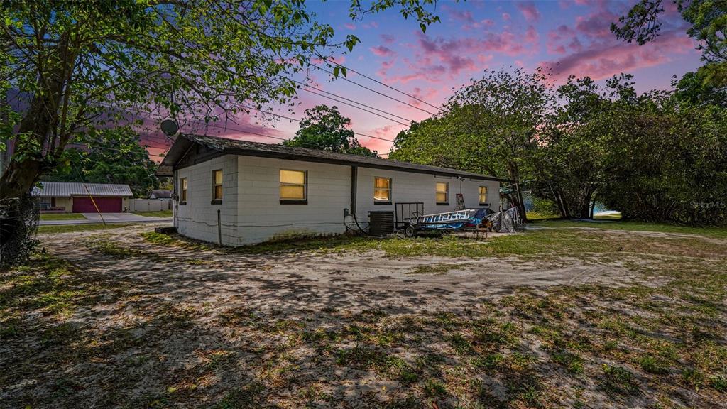 2305 Northeast 35th Street Ocala, FL 34479 - Photo 3 of 26 a house view with a backyard space