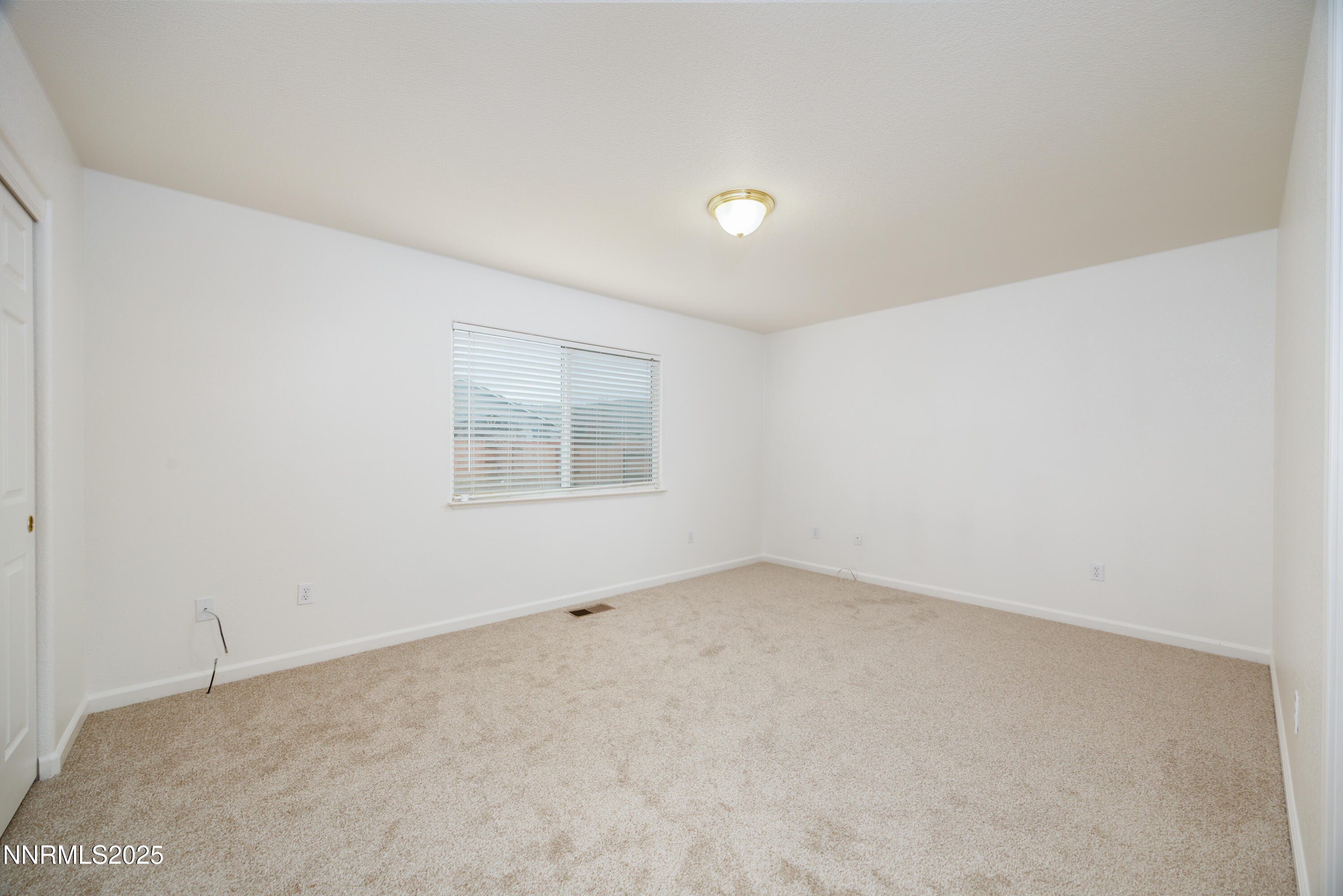 17635 Lake Powell Drive Reno, NV 89508 - Photo 17 of 23 an empty room with a window