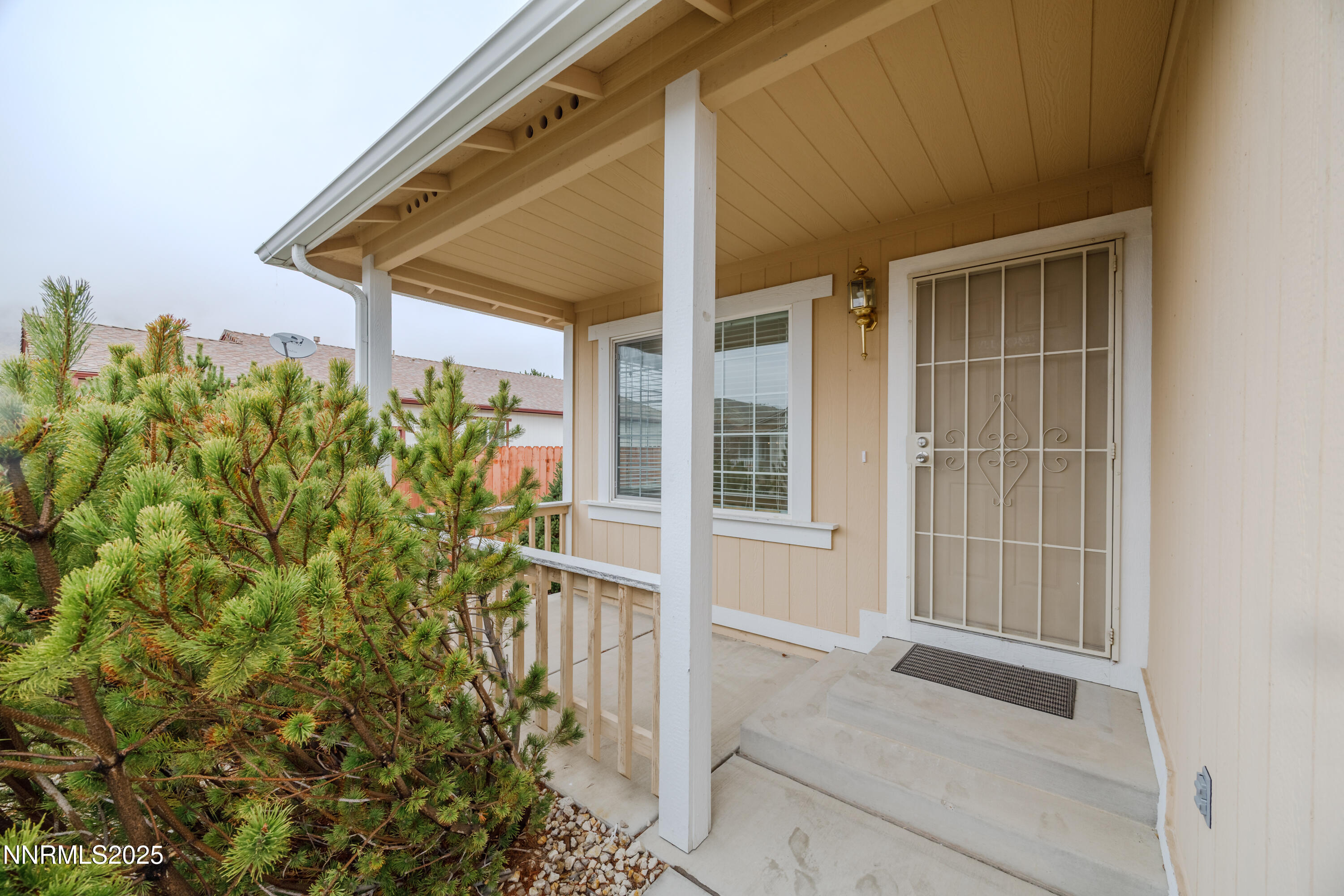 17635 Lake Powell Drive Reno, NV 89508 - Photo 2 of 23 front view of a house with a small yard