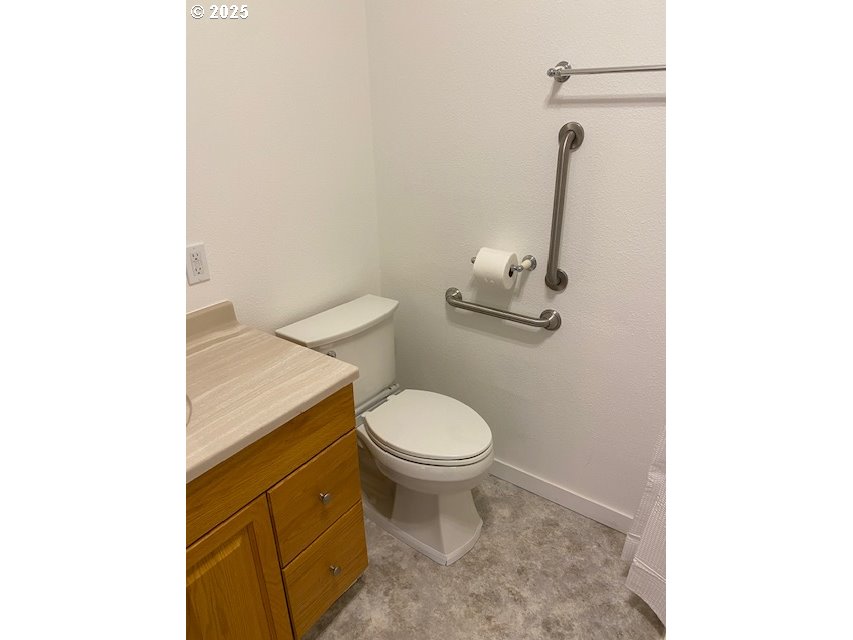 82277 Davisson Road Creswell, OR 97426 - Photo 11 of 48 a bathroom with a toilet and a sink