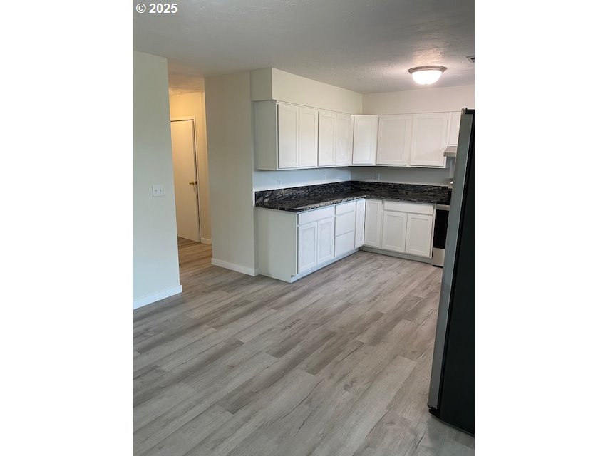 82277 Davisson Road Creswell, OR 97426 - Photo 20 of 48 a kitchen with a refrigerator and a sink