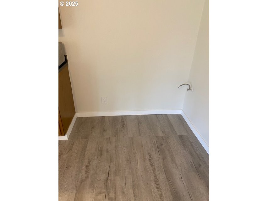 82277 Davisson Road Creswell, OR 97426 - Photo 23 of 48 a view of a room with wooden floor