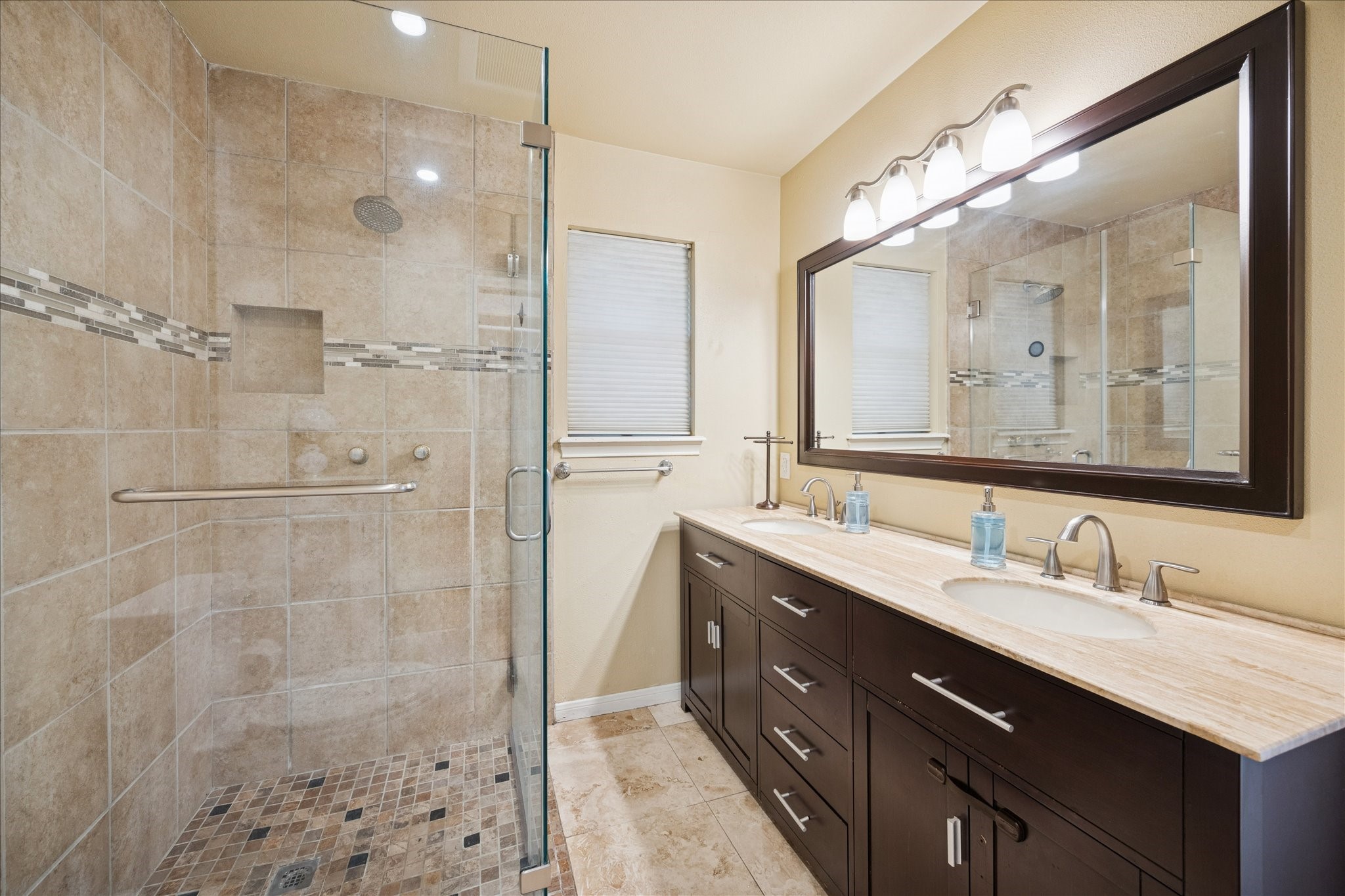 10050 Locke Lane Houston, TX 77042 - Photo 16 of 31 a bathroom with a double vanity sink mirror and double