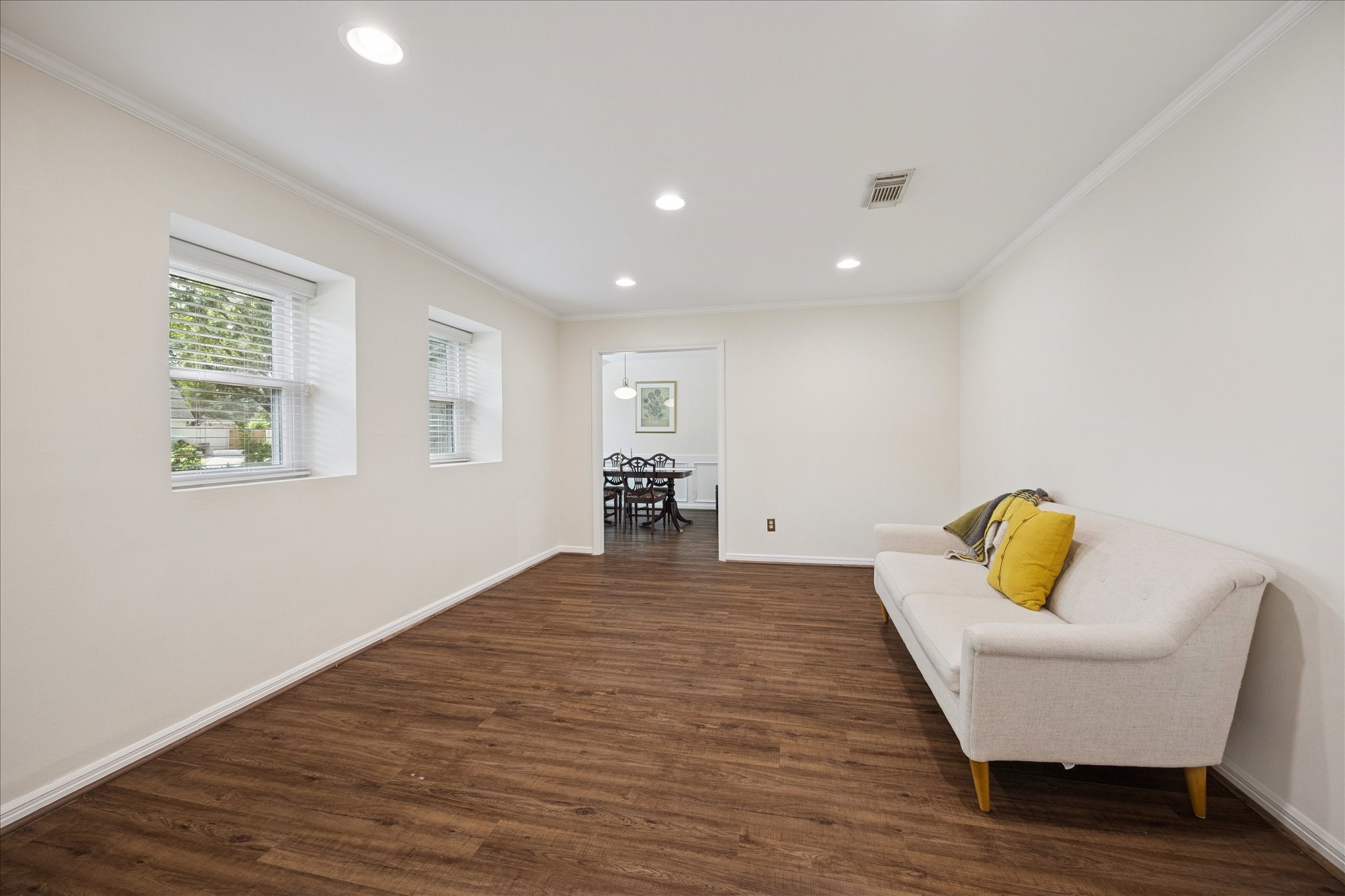 10050 Locke Lane Houston, TX 77042 - Photo 18 of 31 a room with furniture and wooden floor