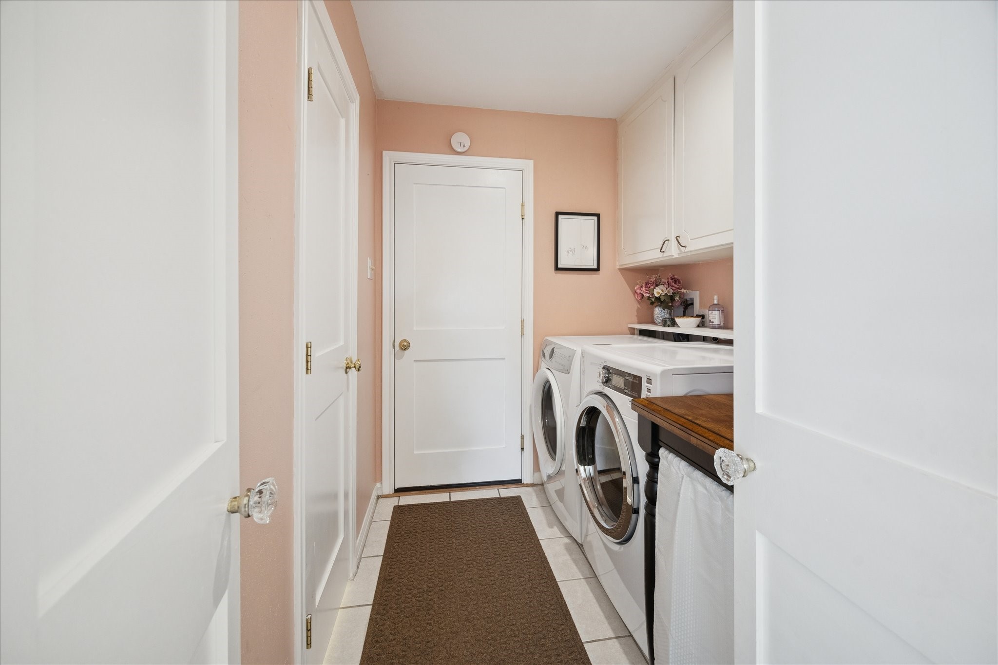 10050 Locke Lane Houston, TX 77042 - Photo 25 of 31 a utility room with dryer and washer