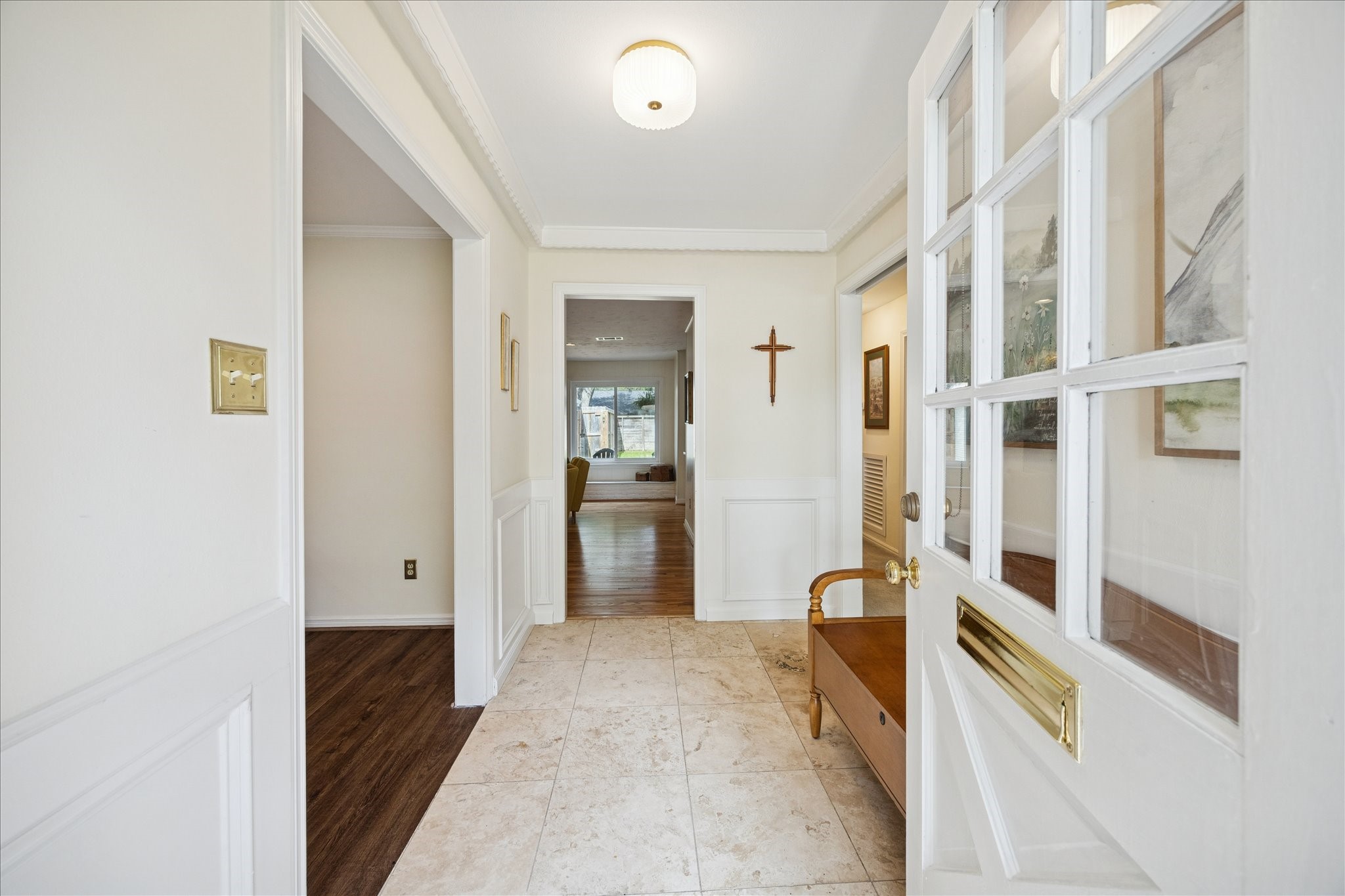 10050 Locke Lane Houston, TX 77042 - Photo 3 of 31 a view of walk in closet with living room