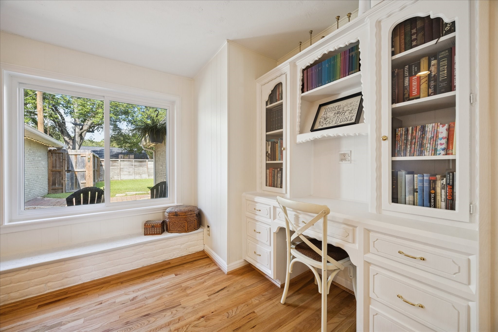 10050 Locke Lane Houston, TX 77042 - Photo 7 of 31 a view of a bedroom with furniture and a window