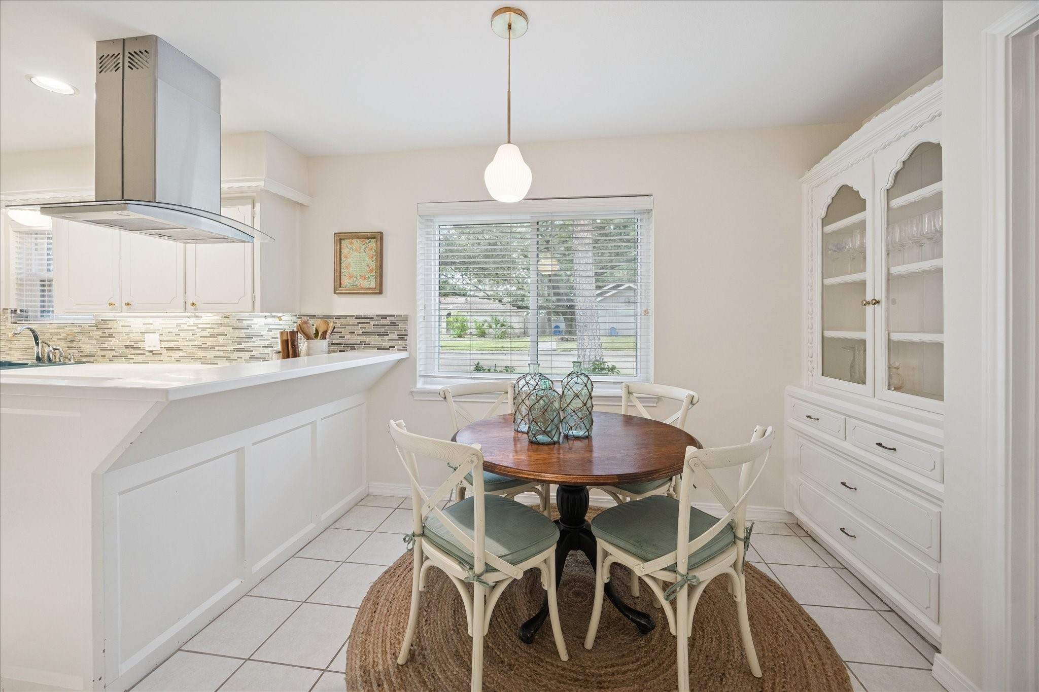 10050 Locke Lane Houston, TX 77042 - Photo 8 of 31 a dining room with furniture and window