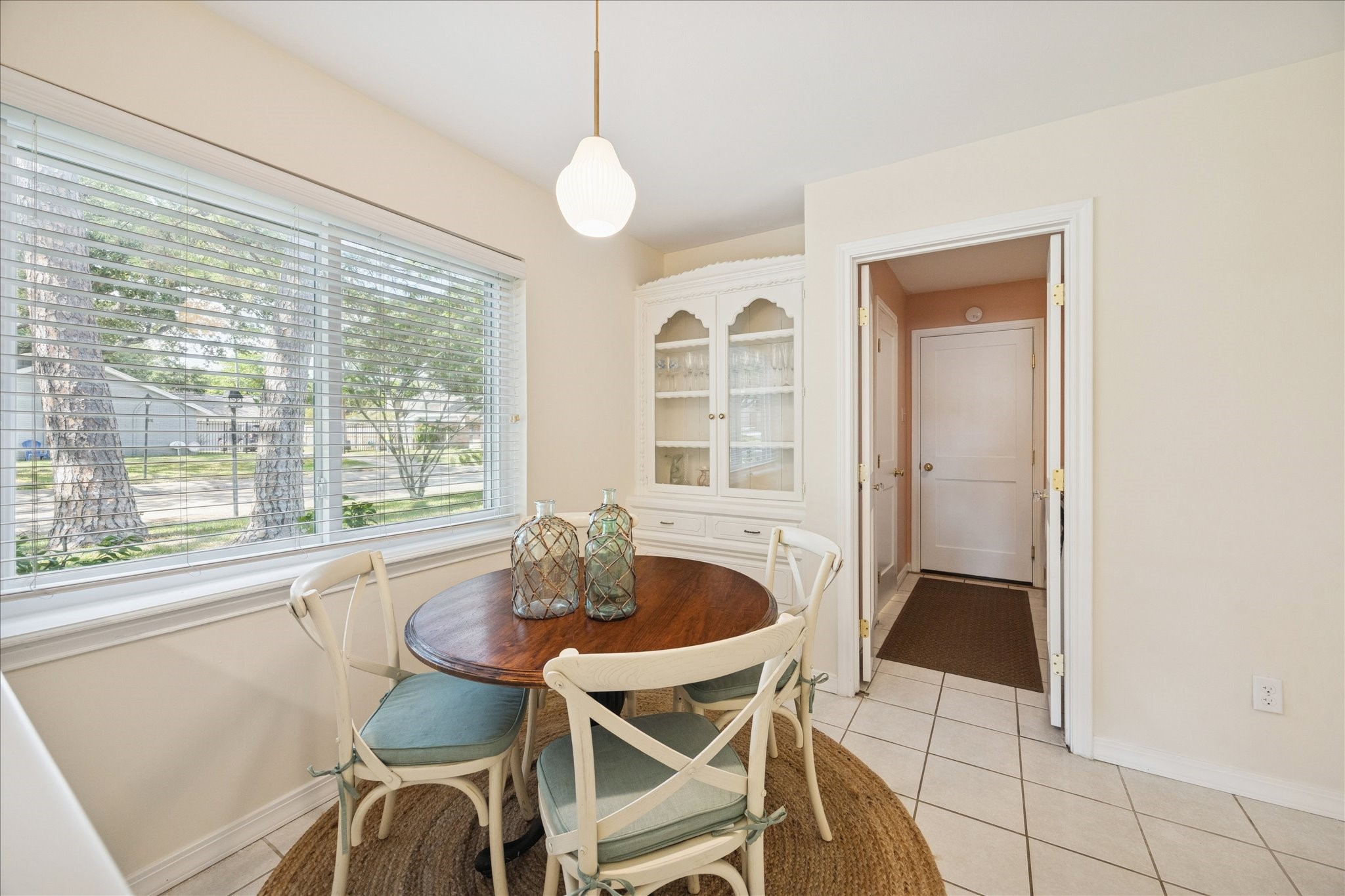 10050 Locke Lane Houston, TX 77042 - Photo 9 of 31 a dining room with furniture and window