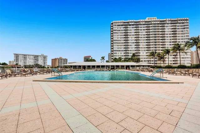 a view of building with terrace