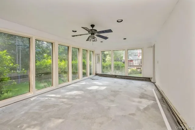 a view of a room with a large window