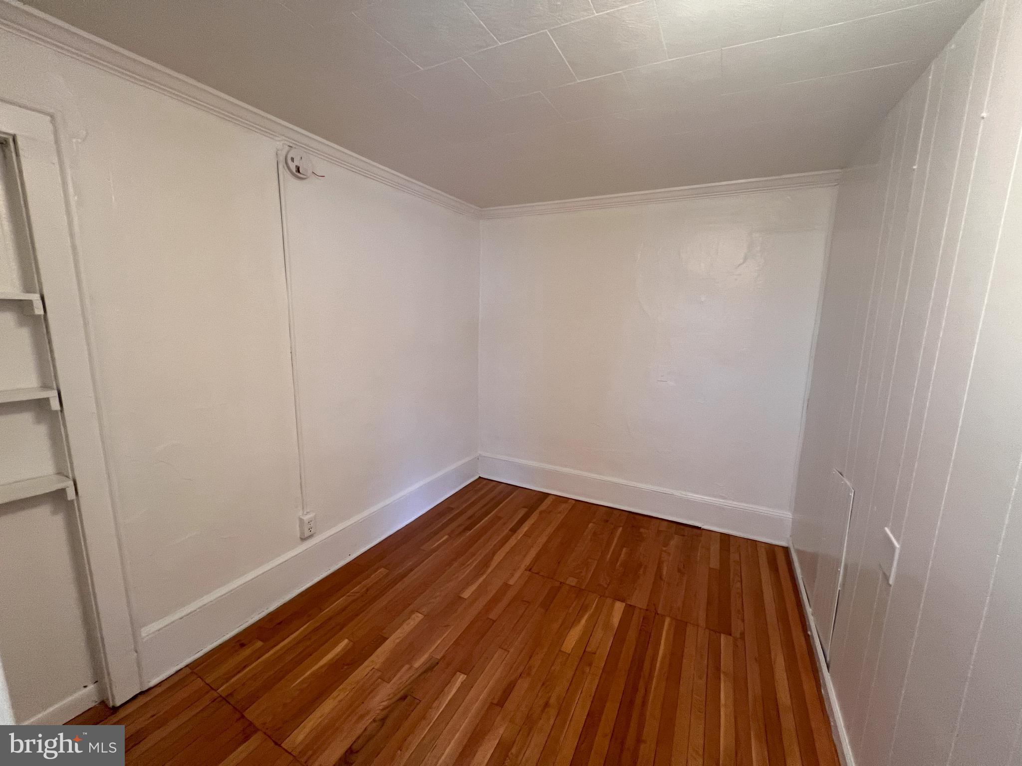 318 South Braddock Street, Unit 3 Winchester, VA 22601 - Photo 4 of 5 a view of small space with racks on the wall