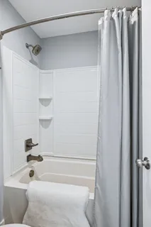 a view of balcony with furniture