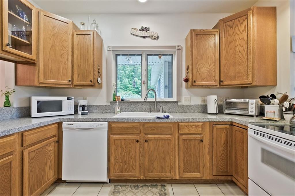 546 Upper Ridge Road Bridgton, ME 04009 - Photo 7 of 35 Plenty of cabinets, white appliances...