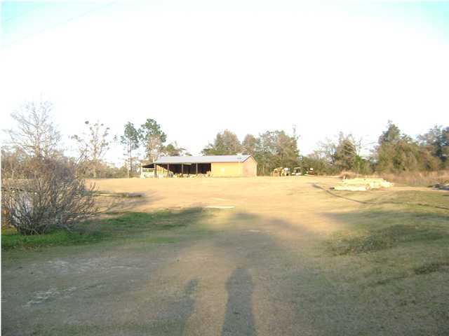 1810 Sandy Ramp Road DeFuniak Springs, FL 32433 - Photo 6 of 10 a view of an ocean beach