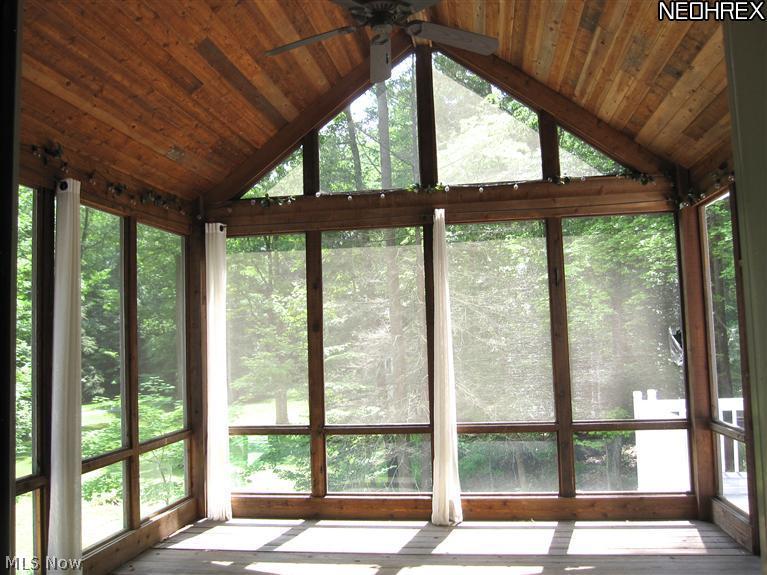 37850 Jackson Road Chagrin Falls, OH 44022 - Photo 10 of 22 Classic, classic, classic... Chagrin valley screened in porch to enjoy those wonderful cool summer breezes and evenings listening to the rambling creek of the nearby Chagrin River.