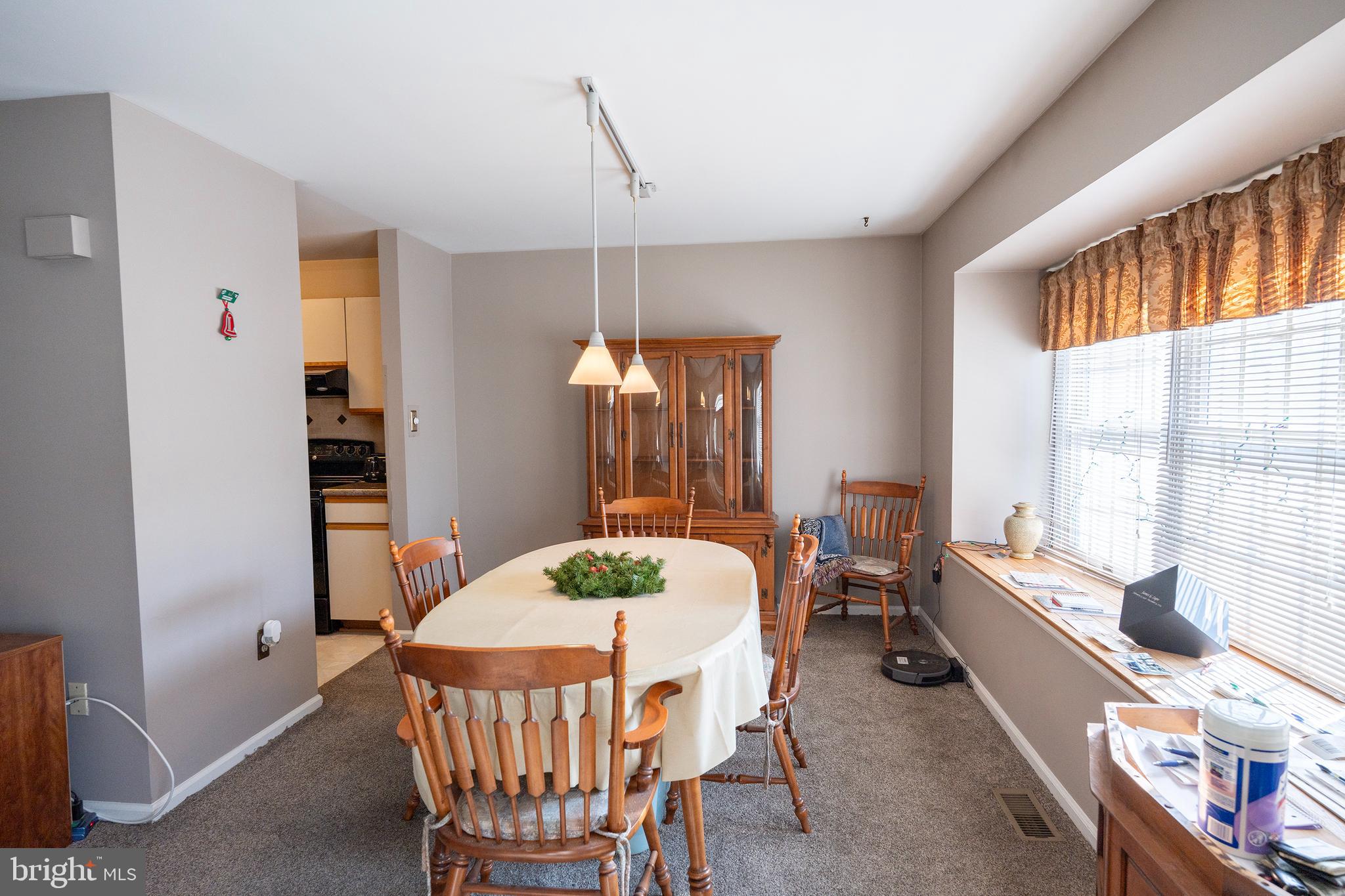 44 Eraser Road Moorestown, NJ 08057 - Photo 11 of 13 a view of a dining room with furniture window and outside view