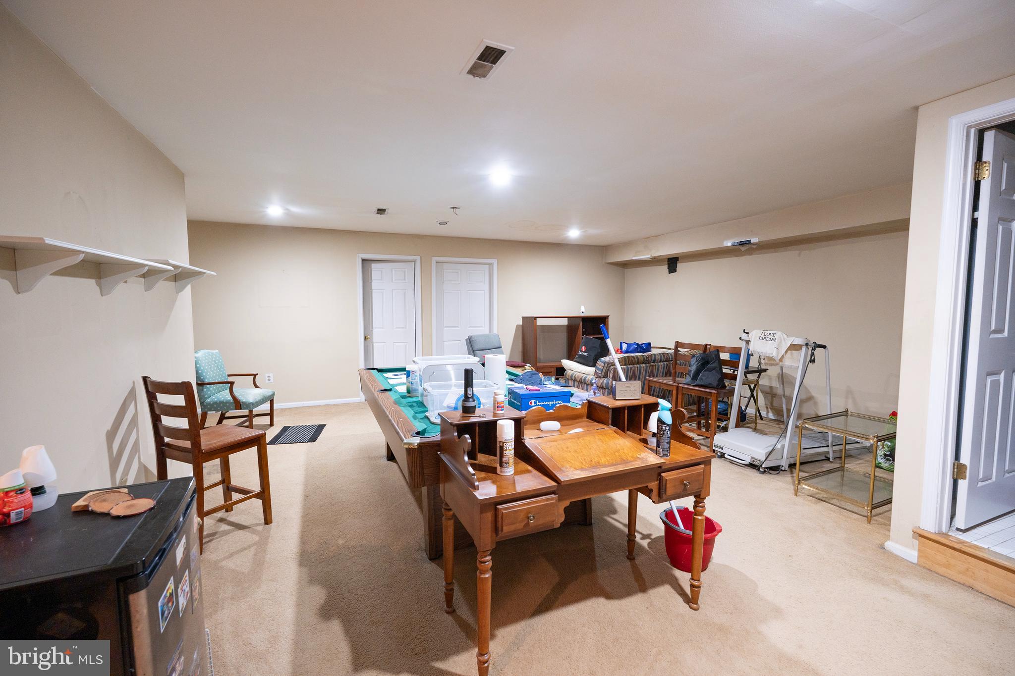44 Eraser Road Moorestown, NJ 08057 - Photo 12 of 13 a living room with furniture a table and chairs
