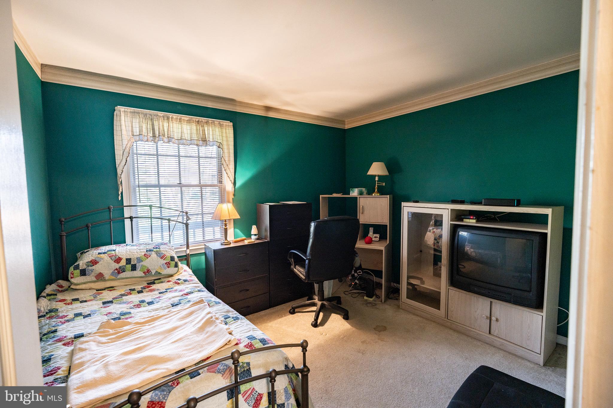 44 Eraser Road Moorestown, NJ 08057 - Photo 7 of 13 a bedroom with a bed and large windows