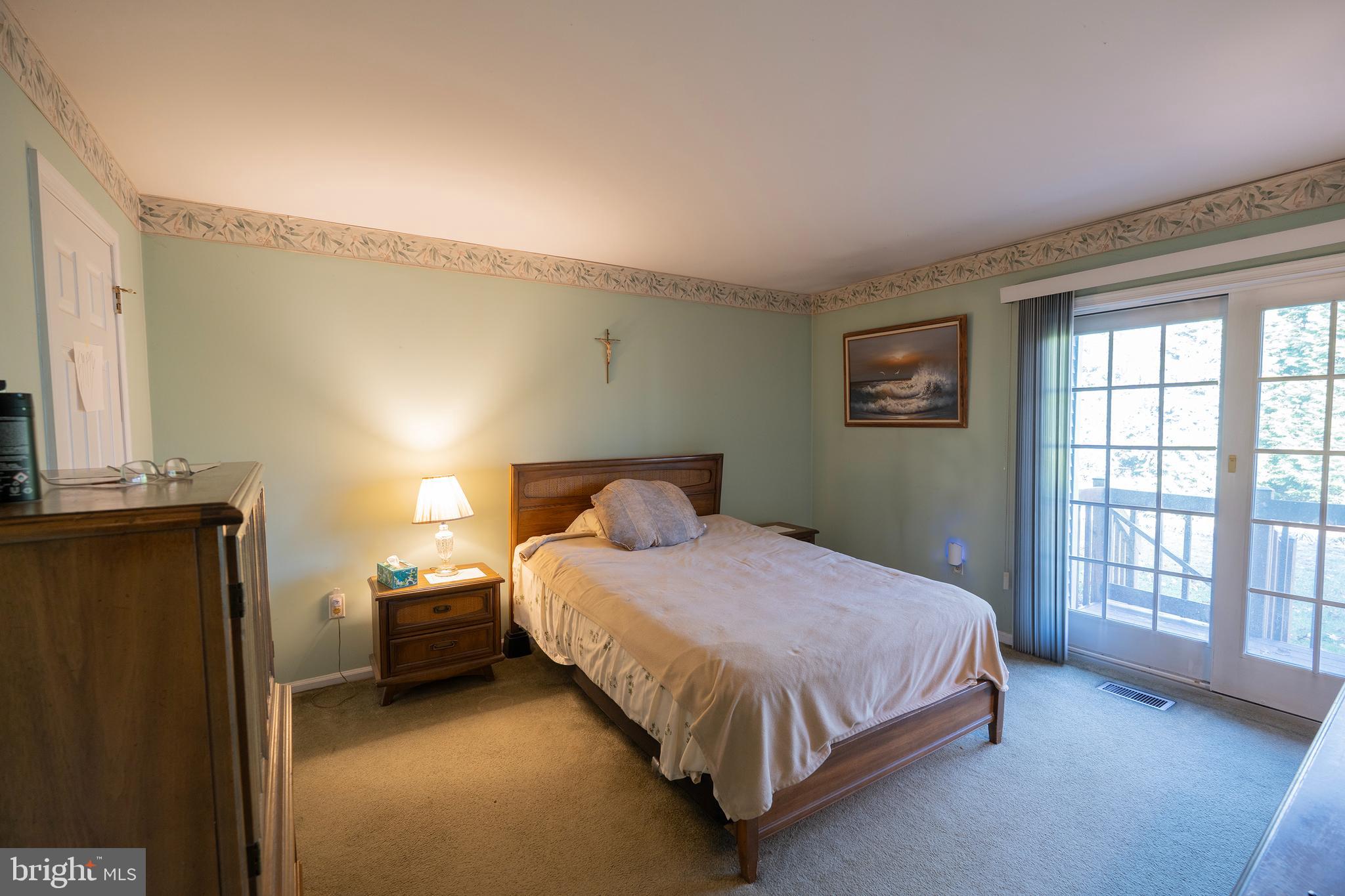 44 Eraser Road Moorestown, NJ 08057 - Photo 8 of 13 a bedroom with a bed and window