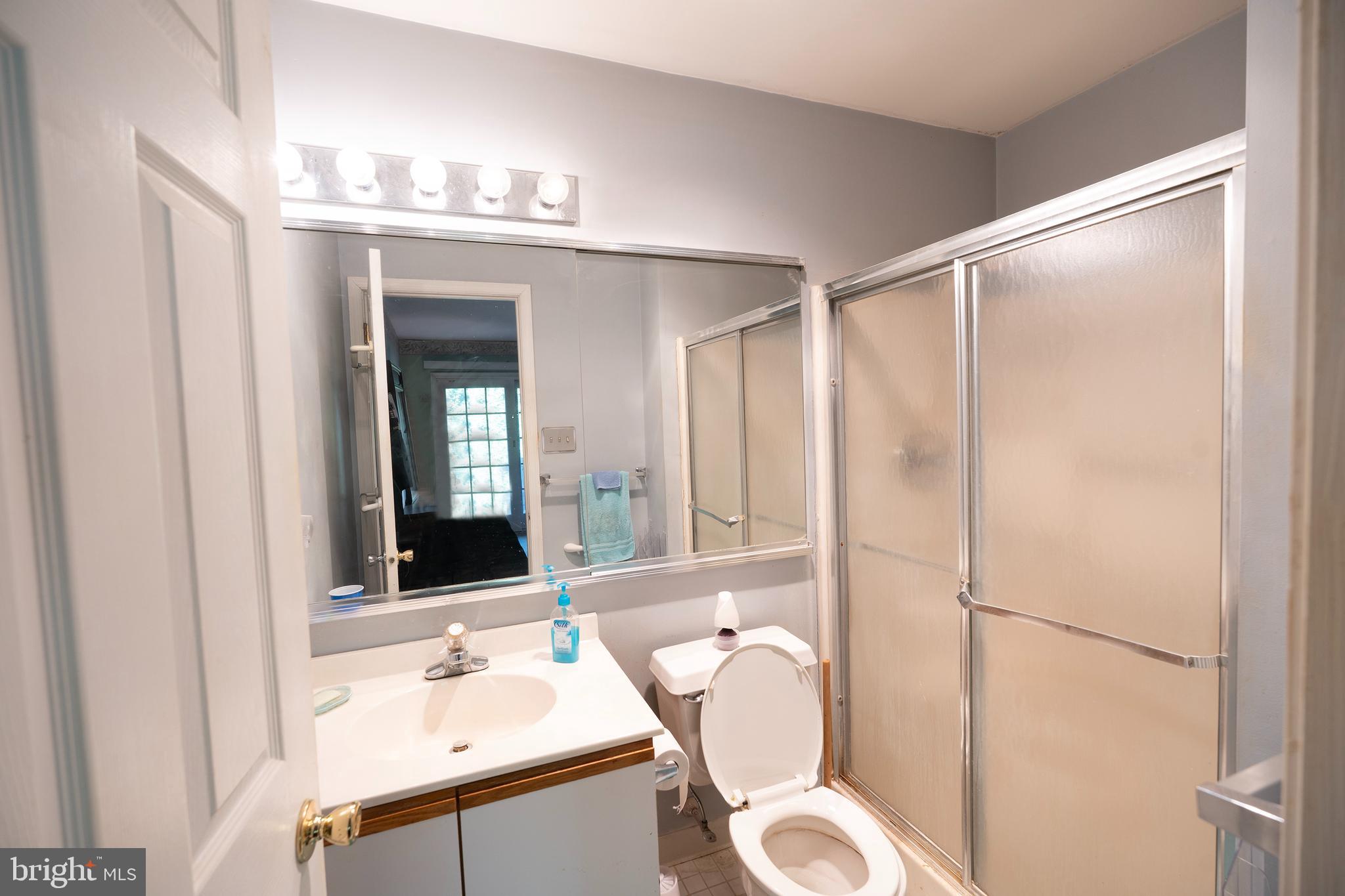 44 Eraser Road Moorestown, NJ 08057 - Photo 9 of 13 a bathroom with a sink toilet and shower