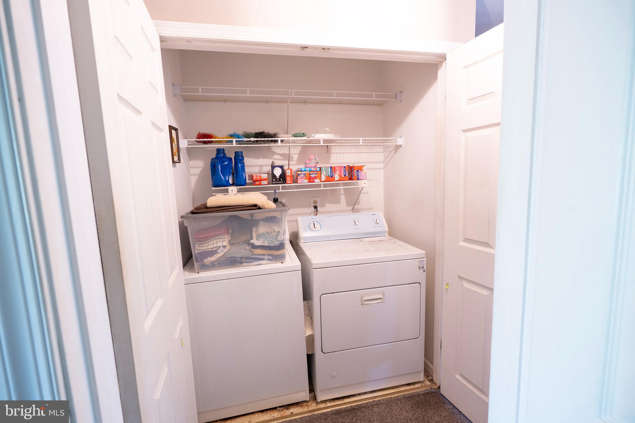 44 Eraser Road Moorestown, NJ 08057 - Photo 10 of 13 a storage room with washer and dryer