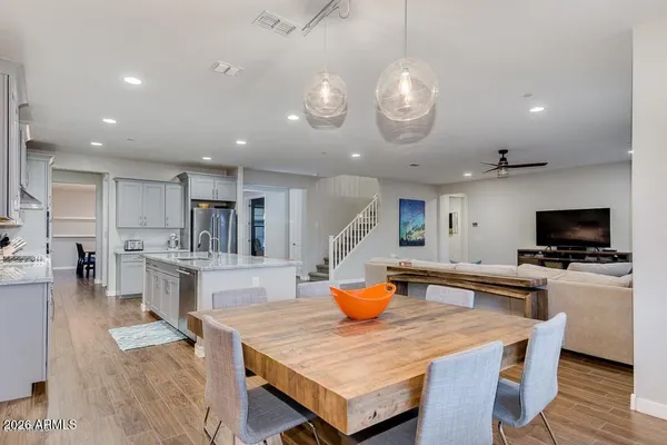 a bedroom with a bed and flat screen tv