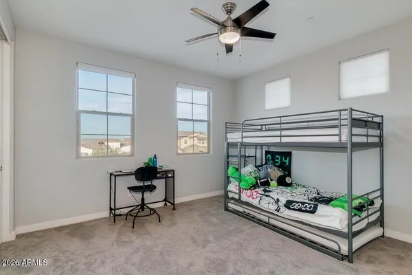 a view of a livingroom with furniture window and wooden floor