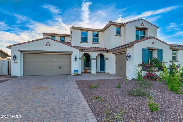 a view of entryway with wooden floor and stairs